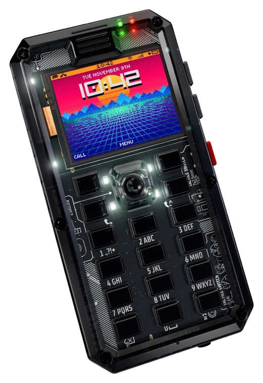 MAKERphone 2.0: a transparent-cased handheld phone with a physical keypad and a colour screen showing its dialler.
